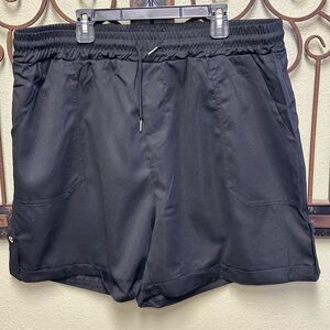 Boutique black stretchy tie waist cuff hem pocket pull on shorts